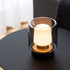 Ambience Lamp Intelligent+ with New York stainless steel base and frosted glass, shown outdoors on a table