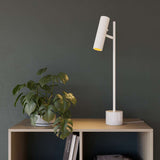 White Expo Table lamp with aluminum body and polished marble base on a light background