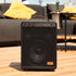 Portable Boom 150 Bluetooth speaker with steel and aluminum frame in a casual setting