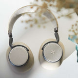 Beige SACKit Touch 410 wireless headphones with rotatable earcups and PU-leather material