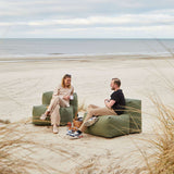 Soft Sofa Outdoor 2-seater in Kirra Olive fabric set on a light background