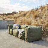 Soft Sofa Outdoor 3-seater sofa in Kirra Olive fabric set outdoors on a patio