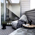 Black Pouf Noir limited edition with geometric jacquard textile, round shape, and soft filling on a white background.