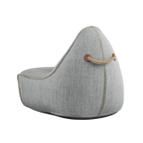 Cobana Lounge Chair in sand melange with linen stitches, soft rounded shape and low backrest.