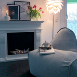 Cobana Lounge Chair in sand melange with linen stitches, soft and rounded bean bag style design.