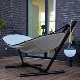 Cobana Hammock in Cobana Grey with black powder-coated aluminum stand outdoors