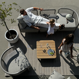 Kirra Lounge Chair in sand color with powder-coated aluminum frame and Olefin textile upholstery.