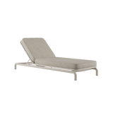 Neutral upholstered sackit sunbed with adjustable backrest and durable light frame designed for comfortable outdoor lounging in Nordic weather