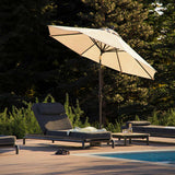 Noir Kirra Side Table with teak wood top and powder-coated aluminum frame in outdoor setting