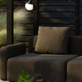 Black Cobana Cushion with water-repellent Olefin fabric for outdoor sofa seating.