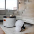 Round Light 250 outdoor lamp with a white dome and hempen rope handle on a wooden surface