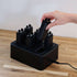 Black ABS-plastic Battery Charging Station with six slots and a 1.5m EU plug cable on a white background