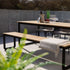 Outdoor patio bench with powder-coated aluminum frame and teak wood seat, measuring 190x37 cm.