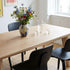 Edge Dining Table made of FSC-certified European oak with faceted edges and matte lacquered surface