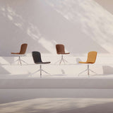 Chair no. One S1 swivel dining chair in Luna Sandstone leather with polished aluminum base.