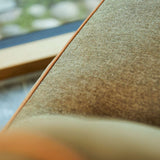 SACKit Chair Indoor in Cosmo Olive fabric with rounded shape and soft foam filling on a light floor.