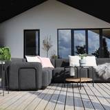 Cobana Lounge Sofa 5-seater corner outdoor sofa in black without armrest with cushions on a terrace