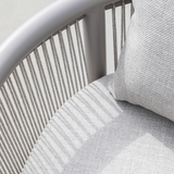 Kirra Lounge Sofa corner section in Kirra Sand with aluminum frame and light olefin fabric outdoors