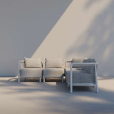 Kirra Lounge Sofa corner module in sand color with powder-coated aluminum frame and Olefin textile cushions outdoors