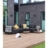 Cobana Lounge Sofa in black with four modular sections arranged in a corner without armrests outdoors