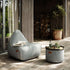 Cobana Lounge Chair in sand melange with linen stitches, soft rounded shape and low backrest.