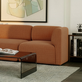 Two-seater Fjord Sofa in Cosmo Terracotta with soft rounded edges and Scandinavian design.