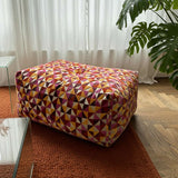 Soft Sofa Indoor pouf in Levanka fabric with soft, rounded shape and neutral tone on a light background