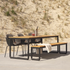 Outdoor patio dining table with rounded legs, powder-coated aluminum frame, and teak wood top