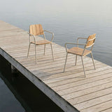 Kirra Patio Chair in taupe powder-coated aluminum and FSC-certified teak wood on a light background