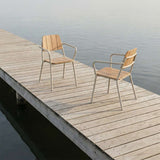Kirra Patio Chair in taupe powder-coated aluminum and FSC-certified teak wood on a light background
