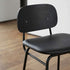 Low bar stool with backrest featuring Terra Safari leather seat and powder-coated steel frame