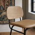 Frame Bar Stool with backrest featuring a powder-coated steel frame and leather seat in a neutral setting.