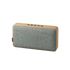 Bluetooth speaker with natural oak wood and Fiord textile from KVADRAT in a simple rectangular design