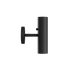 Black aluminum Expo Wall light with round base and slim cylindrical design mounted on wall.