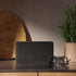 Move 50 Care Bluetooth speaker in coal color with biodegradable frame and silicone buttons