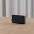 Move 50 Care speaker in coal color with biodegradable frame and silicone buttons.