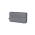 Grey Move 50 Care speaker with biodegradable frame and silicone buttons on a white background