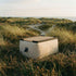 Square teak and aluminum outdoor tray with black frame designed for Soft Sofa Outdoor Pouf.