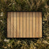 Square outdoor tray made of teak wood with black powder-coated aluminum frame