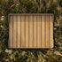Square taupe teak and aluminum outdoor patio pouf tray with clean lines and a smooth surface