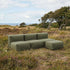 Kirra Olive Soft Sofa Outdoor 3-seater open with pouf in an outdoor setting