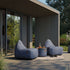 Cobana Lounge Chair in Cobana Grey with a soft, rounded shape and backrest for indoor and outdoor use.