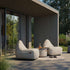 Cobana Lounge Chair in Cobana Grey with a soft, rounded shape and durable fabric.