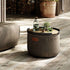 Round Cobana Grey pouf with durable fabric and hand-sewn stitches for indoor and outdoor use