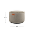 Round Cobana Grey pouf with durable fabric and hand-sewn stitches, suitable for indoor and outdoor use.