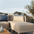 Rectangular Tide Cushion in sand and indigo colors made of outdoor fabric with removable cover.