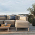 Sand and indigo color block outdoor cushion with removable cover on lounge chair