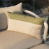 Sand and indigo color block Tide Cushion made for outdoor use on a white chair.