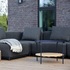 Outdoor patio sofa table with black powder-coated aluminum frame and teak wood shelf underneath