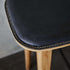 Nordic bar stool with solid oak frame and Luna Carbon leather seat with matching cross-stitching.